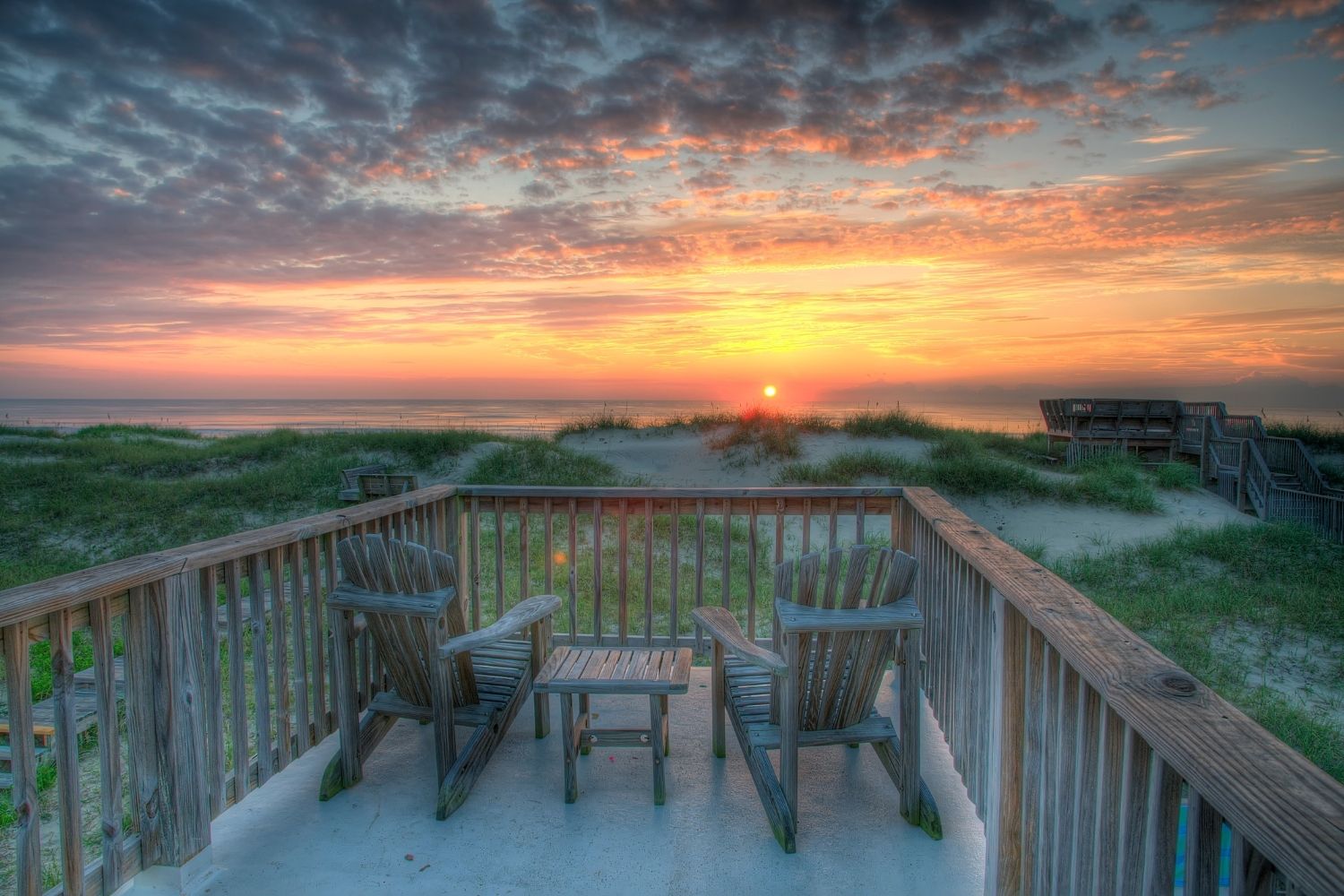 A Deck With Chairs On The Beach At Duck NC