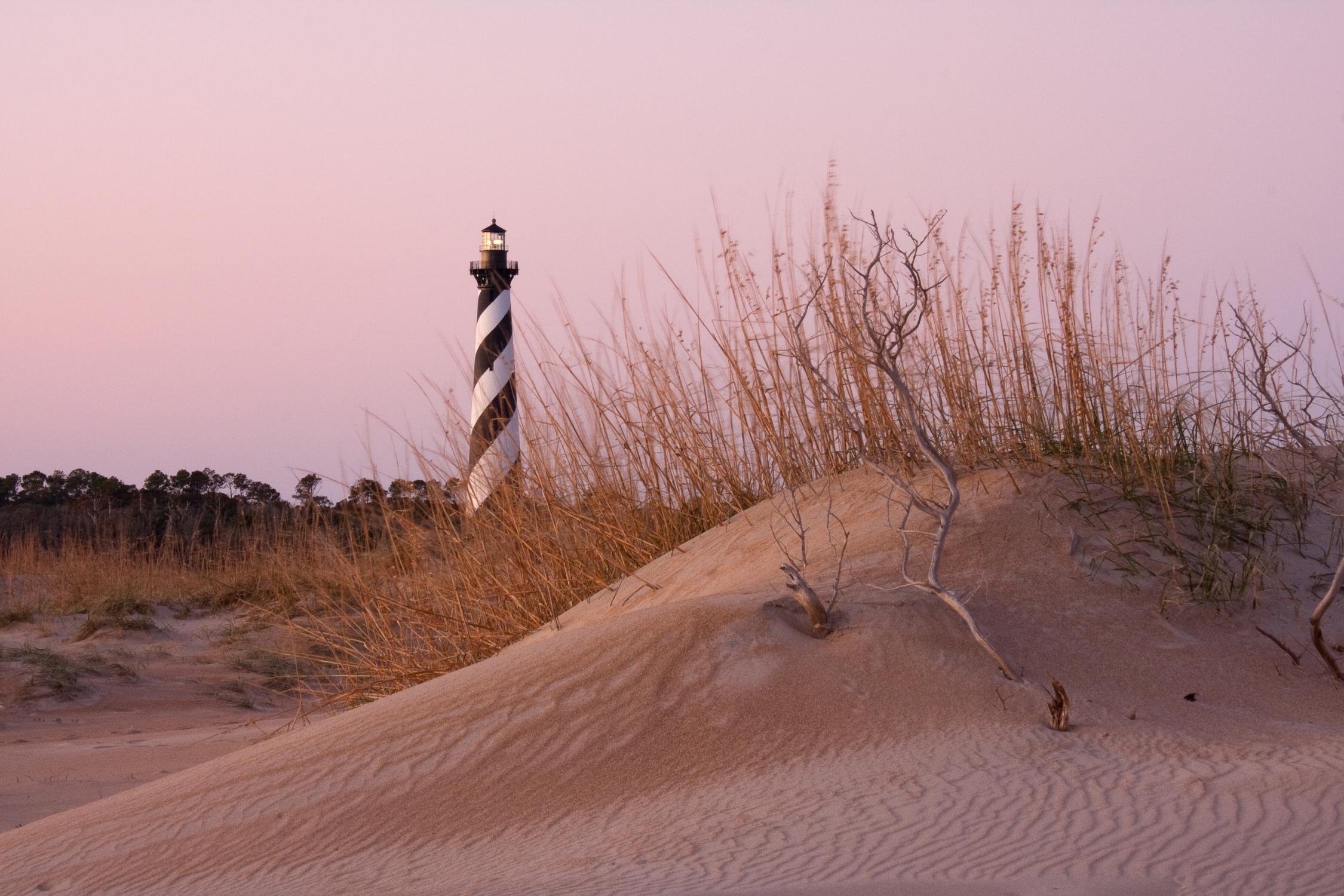 Cape Hatteras Lighthouse Behind A Sand Dune On The Outer Banks